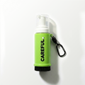 Green and white spray bottle with 'CAREFUL' text on a white background