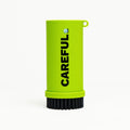 Green Careful Golf Caddy brush with 'CAREFUL' text on a white background